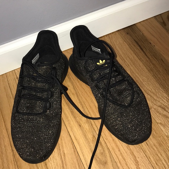 black and gold adidas tubular